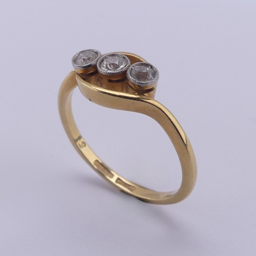 209 - A three stone diamond Ring, the old cut stones millegrain set in 18ct yellow gold and platinum, appr... 