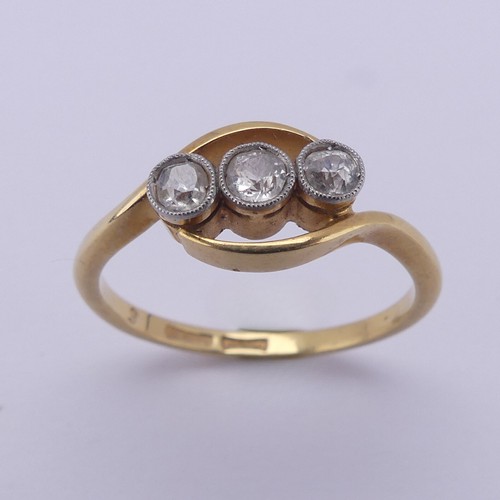 209 - A three stone diamond Ring, the old cut stones millegrain set in 18ct yellow gold and platinum, appr... 