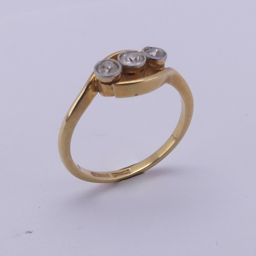 209 - A three stone diamond Ring, the old cut stones millegrain set in 18ct yellow gold and platinum, appr... 