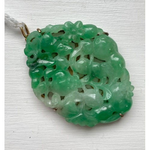 272 - A Chinese Jade Pendant, carved and pierced with a rodent amongst foliage and flowers, unmarked yello... 