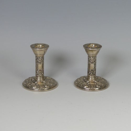 88 - A pair of silver Candlesticks, by W I Broadway & Co., hallmarked Birmingham 1979, with birds and... 