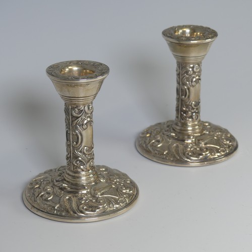 88 - A pair of silver Candlesticks, by W I Broadway & Co., hallmarked Birmingham 1979, with birds and... 