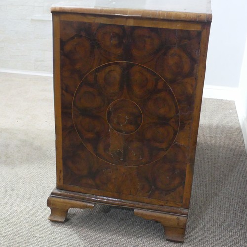 340 - An early 18th century walnut oyster veneered Chest of drawers, the rectangular moulded top with radi... 