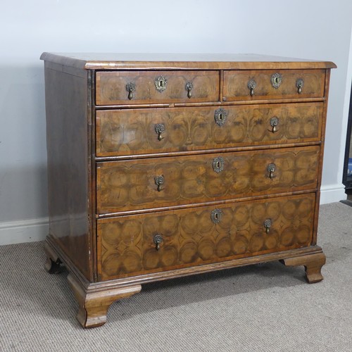 340 - An early 18th century walnut oyster veneered Chest of drawers, the rectangular moulded top with radi... 