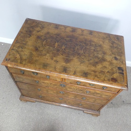 340 - An early 18th century walnut oyster veneered Chest of drawers, the rectangular moulded top with radi... 