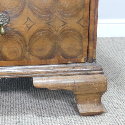 340 - An early 18th century walnut oyster veneered Chest of drawers, the rectangular moulded top with radi... 