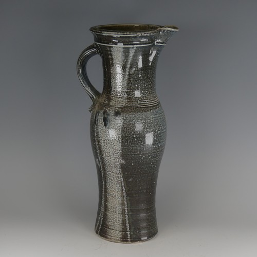 1 - Michael Casson (1925-2003) a studio pottery salt-glazed Jug, of slender baluster form, decorated in ... 