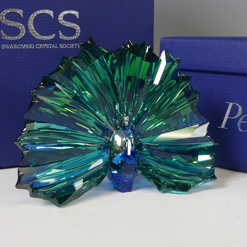 18 - A Swarovski Crystal Glass 'Peacock Arya' Figure, in box with paperwork and gloves, H 11cm.... 