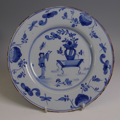 9 - A 19thC English delft Plate, possibly London, decorated in the Chinese style, with central willow ha... 