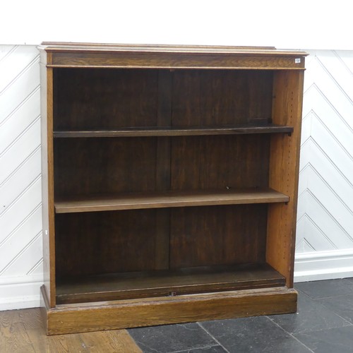 347 - A 20th century oak open bookcase, of three adjustable shelves, raised on plinth base, W 106 cm x H 1... 