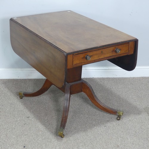 352 - An antique mahogany pembroke Table, raised on quadraform reeded base and brass castors, W 114 cm x H... 