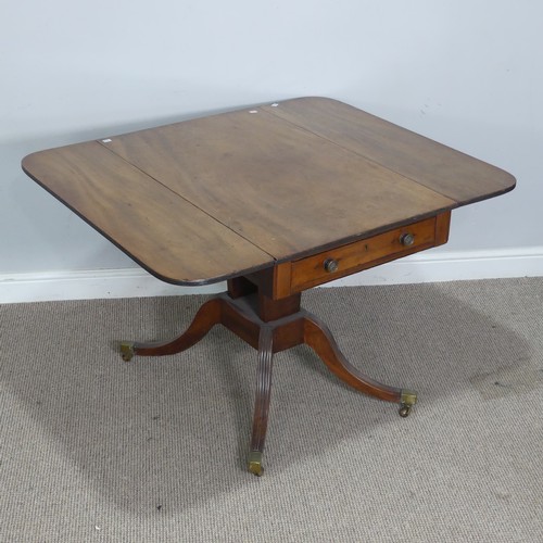 352 - An antique mahogany pembroke Table, raised on quadraform reeded base and brass castors, W 114 cm x H... 