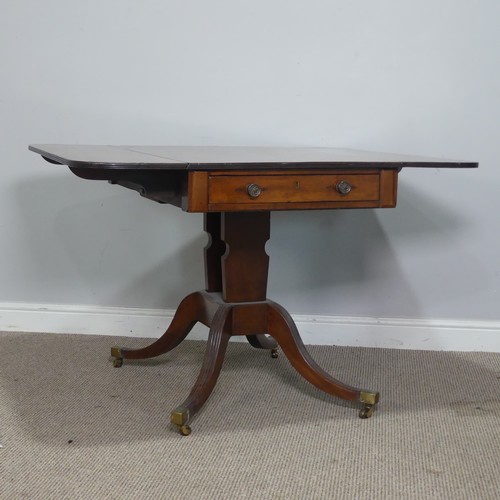 352 - An antique mahogany pembroke Table, raised on quadraform reeded base and brass castors, W 114 cm x H... 