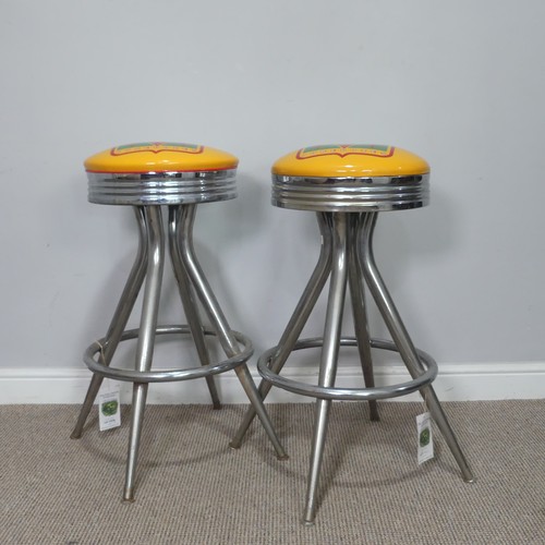 379 - A pair of ''Rock-ola'' Bar Stools, having printed tops on chromed bases, the revolving tops read ''R... 