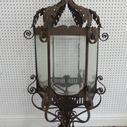 382 - A large 19th century French style wrought Iron Lantern / street Light, pediment with decorative scro... 