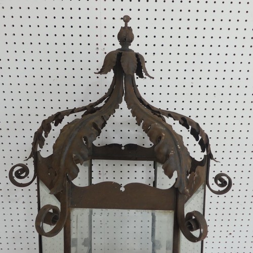 382 - A large 19th century French style wrought Iron Lantern / street Light, pediment with decorative scro... 