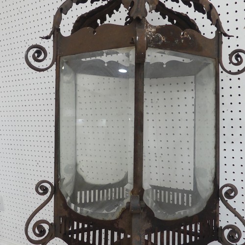 382 - A large 19th century French style wrought Iron Lantern / street Light, pediment with decorative scro... 