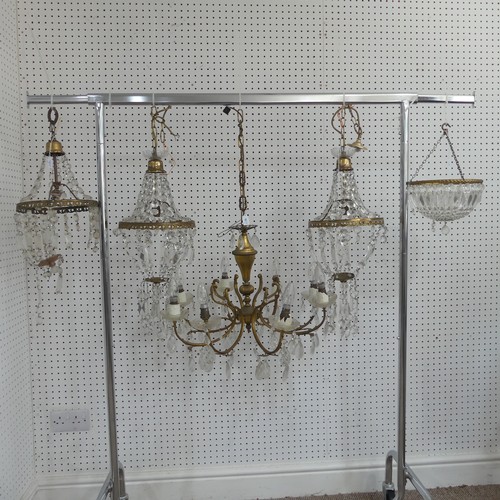 383 - An antique French style eight light brass Chandelier, with scrolled branches and glass lustre drops,... 