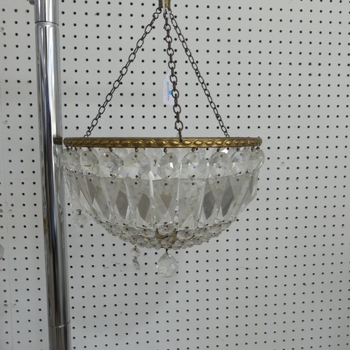 383 - An antique French style eight light brass Chandelier, with scrolled branches and glass lustre drops,... 