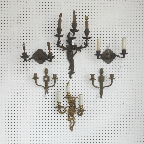 385 - An antique gilt metal three light wall Sconce, of a stylised floral design, L 50 cm, together with a... 