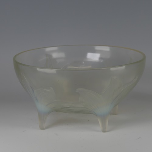 7 - An R. Lalique 'Lys' pattern opalescent glass Bowl, no. 382, raised on four stylised legs, with etche... 