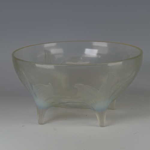 7 - An R. Lalique 'Lys' pattern opalescent glass Bowl, no. 382, raised on four stylised legs, with etche... 