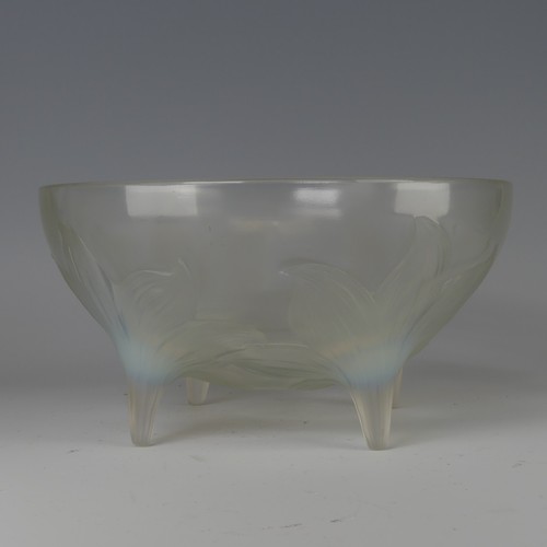 7 - An R. Lalique 'Lys' pattern opalescent glass Bowl, no. 382, raised on four stylised legs, with etche... 