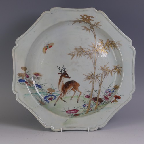 136 - An 18thC Chinese export porcelain famille rose Charger, of octagonal lobed form, decorated in colour... 