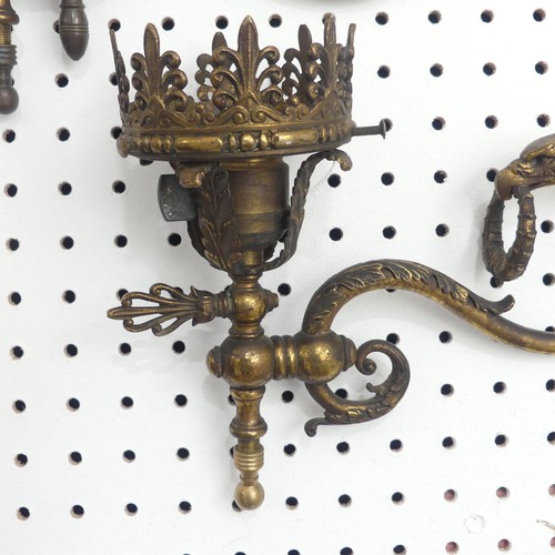 388 - A pair of possibly 19th century gilt metal wall Sconces / Lights, with scrolled and foliate decorati... 