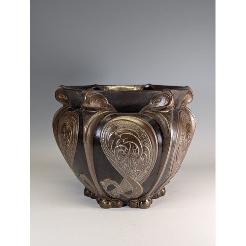 364 - An Art Nouveau Bretby metal effect Jardiniere, with decorative floral design, W 39 cm x H 31 cm x D ... 