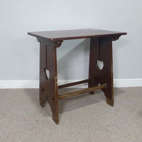 397 - An Arts and Crafts oak side Table, probably Liberty & co, with pierced heart decorations and peg... 