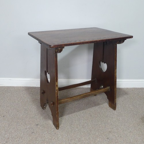 397 - An Arts and Crafts oak side Table, probably Liberty & co, with pierced heart decorations and peg... 