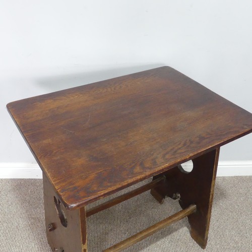 397 - An Arts and Crafts oak side Table, probably Liberty & co, with pierced heart decorations and peg... 