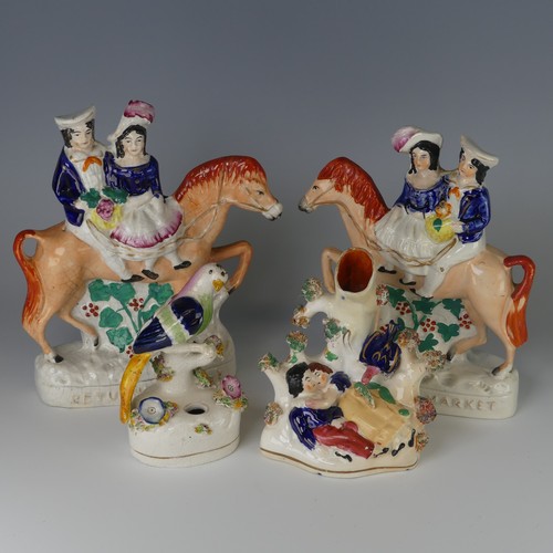 34 - A pair of antique Staffordshire porcelain Flatbacks, 'Returning from the Market' and 'Going to the M... 