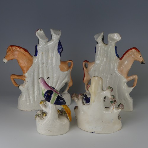 34 - A pair of antique Staffordshire porcelain Flatbacks, 'Returning from the Market' and 'Going to the M... 