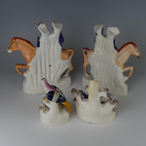 34 - A pair of antique Staffordshire porcelain Flatbacks, 'Returning from the Market' and 'Going to the M... 