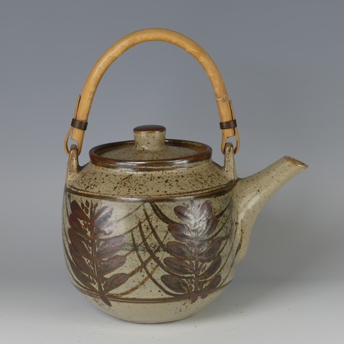 41 - David Leach OBE (1911-2005) a studio pottery Teapot, mottled oatmeal glaze ground with manganese and... 