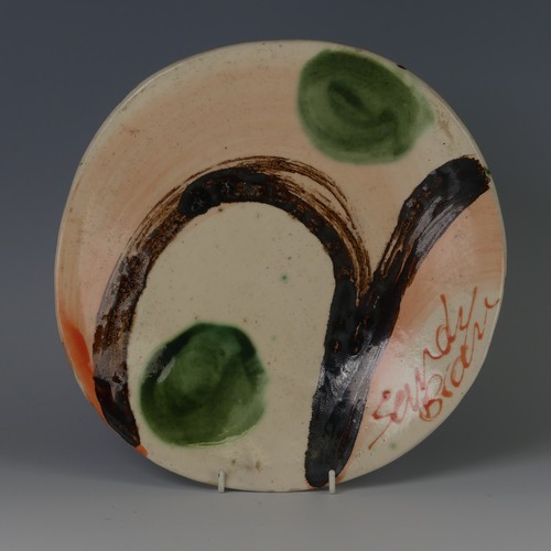 43 - Sandy Brown (b. 1946) an attractive studio pottery stoneware Dish, in a warped circular shape decora... 