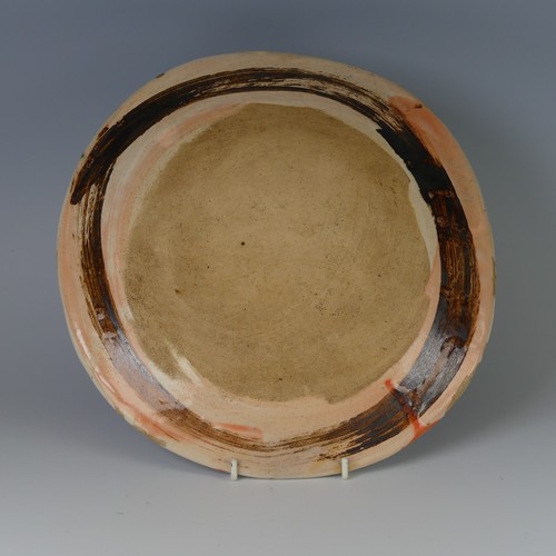 43 - Sandy Brown (b. 1946) an attractive studio pottery stoneware Dish, in a warped circular shape decora... 