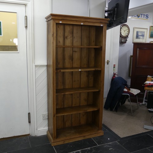 406 - An antique rustic pine open Bookcase, with four shelves, two being adjustable, W 85 cm x H 178 cm x ... 