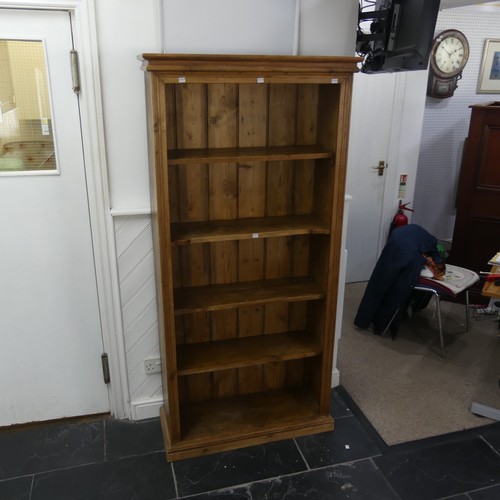 406 - An antique rustic pine open Bookcase, with four shelves, two being adjustable, W 85 cm x H 178 cm x ... 