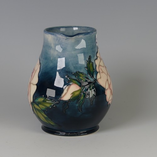 51 - A Moorcroft pottery 'Rose' pattern Vase, designed by Sally Tuffin, decorated in tube-lined design, p... 