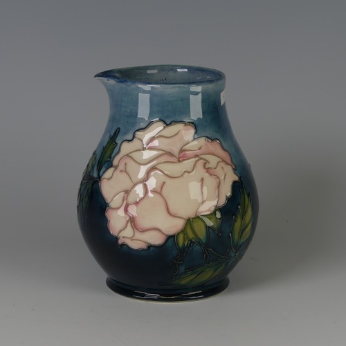 51 - A Moorcroft pottery 'Rose' pattern Vase, designed by Sally Tuffin, decorated in tube-lined design, p... 