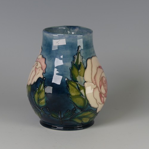 51 - A Moorcroft pottery 'Rose' pattern Vase, designed by Sally Tuffin, decorated in tube-lined design, p... 