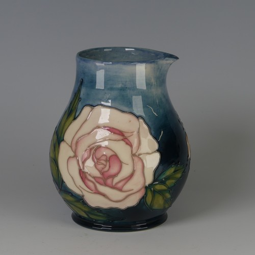 51 - A Moorcroft pottery 'Rose' pattern Vase, designed by Sally Tuffin, decorated in tube-lined design, p... 