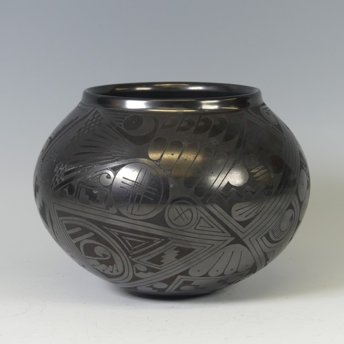 411 - A Macario Ortiz blackware bulbous Vase, with incised signature to base, H 15.5cm.