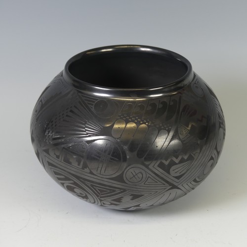 411 - A Macario Ortiz blackware bulbous Vase, with incised signature to base, H 15.5cm.