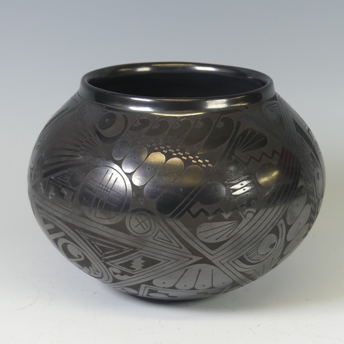 411 - A Macario Ortiz blackware bulbous Vase, with incised signature to base, H 15.5cm.