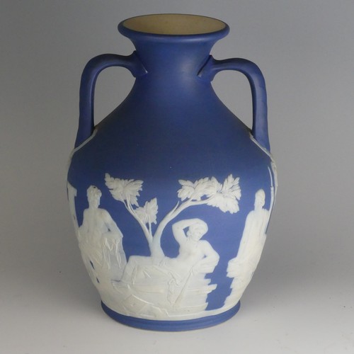 54 - A 19thC Wedgwood blue dip Jasperware Portland Vase, decorated in classical figures, of ovoid form wi... 