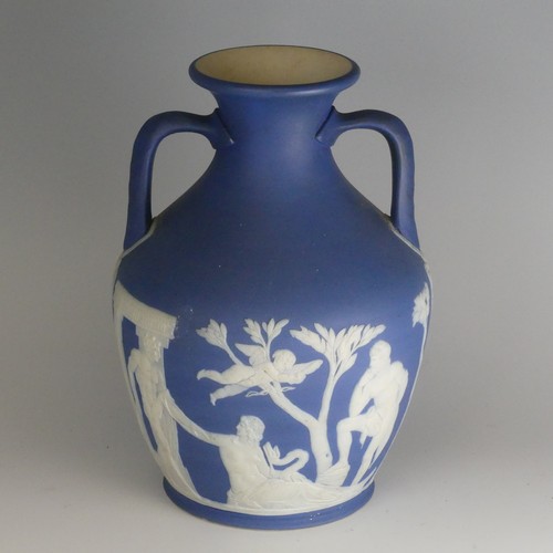 54 - A 19thC Wedgwood blue dip Jasperware Portland Vase, decorated in classical figures, of ovoid form wi... 